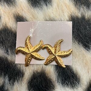 Very light gold starfish earrings with post backs